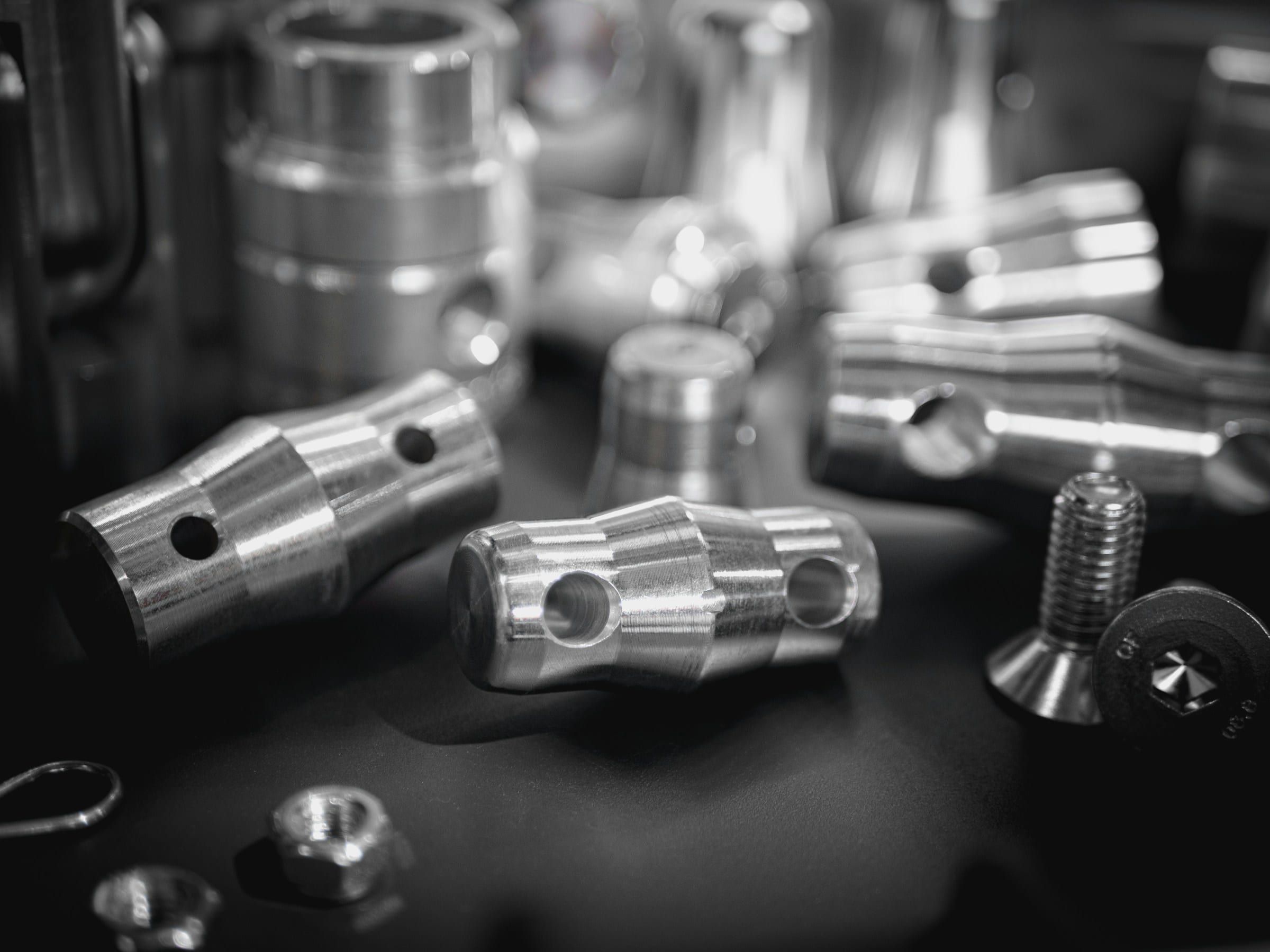 A macro view of precision-machined metal fittings and fasteners